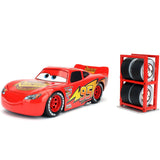 Jada: Die-Cast Metal Vehicle with Tire Rack | Disney Pixar Cars 3 - Lightning McQueen - Escala 1:24